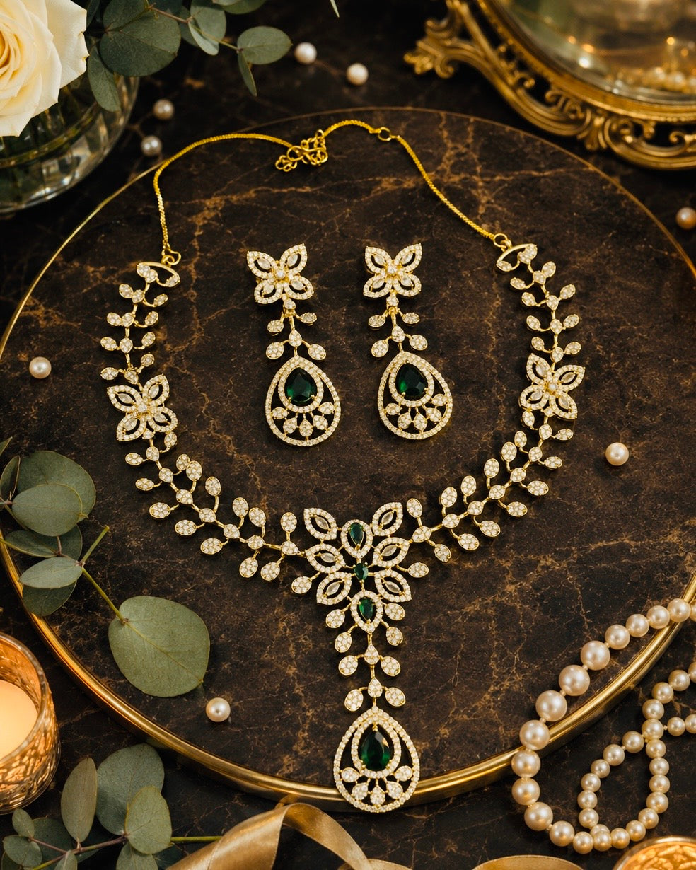 Rajsi Royal floral Antique Necklace Set | Kundan Polki Bridal Jewellery with Emerald Stones | MirakiStylez