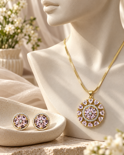 Round Sunburst Chain Pendant and Stud Set in Pink, Gold-tone setting, artistic jewellery display