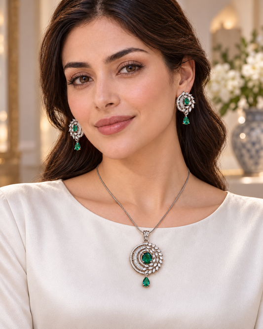 Model wearing celestial halo drop chain pendant and earring set in Green with Silver-tone finish